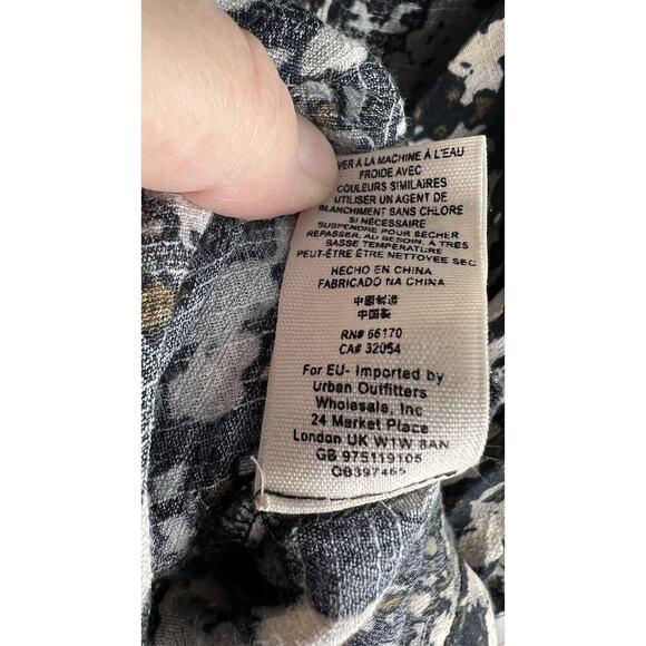 FREE PEOPLE All The Right Ruffles Romper in Black Raven Combo. Size Small - Picture 8 of 11